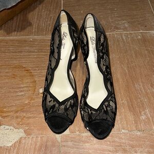 Black lace pumps